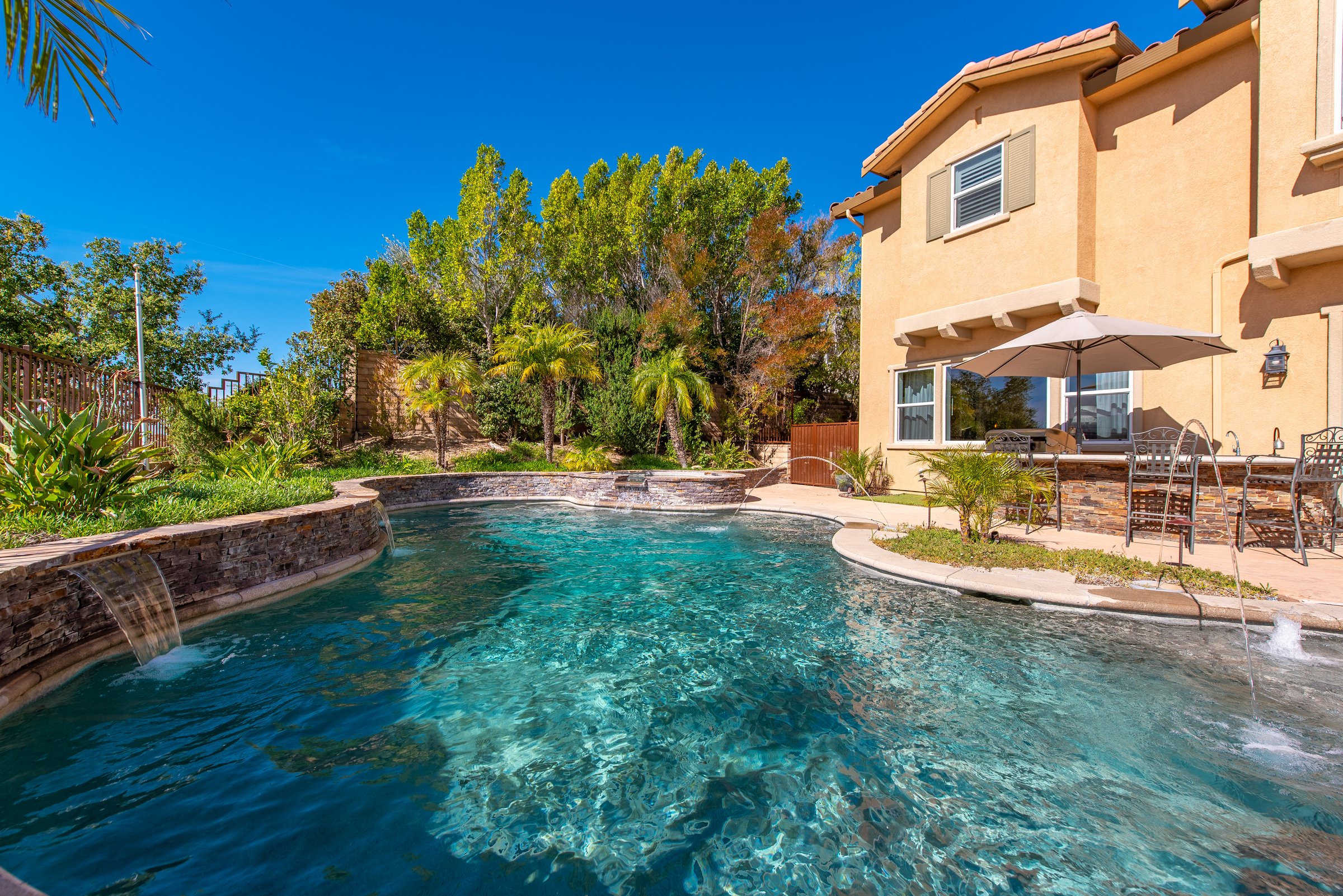 Pool with hillside backdrop